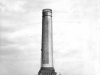 large-concrete-chimney-appears-to-be-battersea-powerstation-with-1-worker