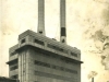 large-factory-with-two-tall-metal-chimneys-three-other-chimneys-in-background